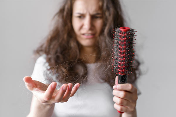 Understanding Hair Fall: Causes, Symptoms, and Treatment Options